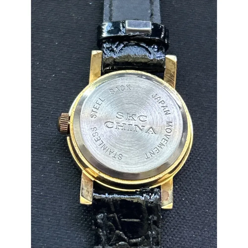 SKC gold tone